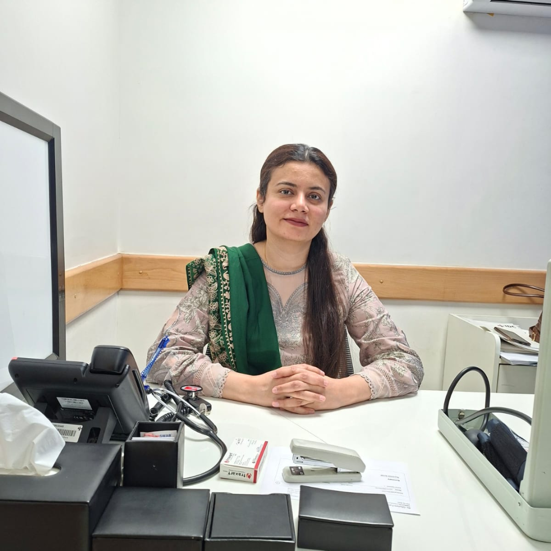 Dr Fatima Waseem, female gynaecologist, consulting a patient in her Faisalabad clinic
